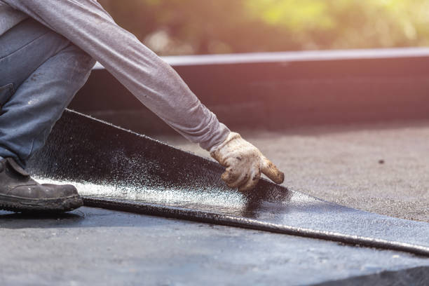 Professional Waterproofing technician working in Fair Haven, NY